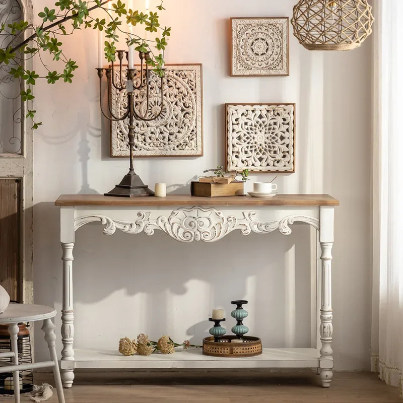 White cream French carved entrance table, old wall table with new products in the living room, home storage table