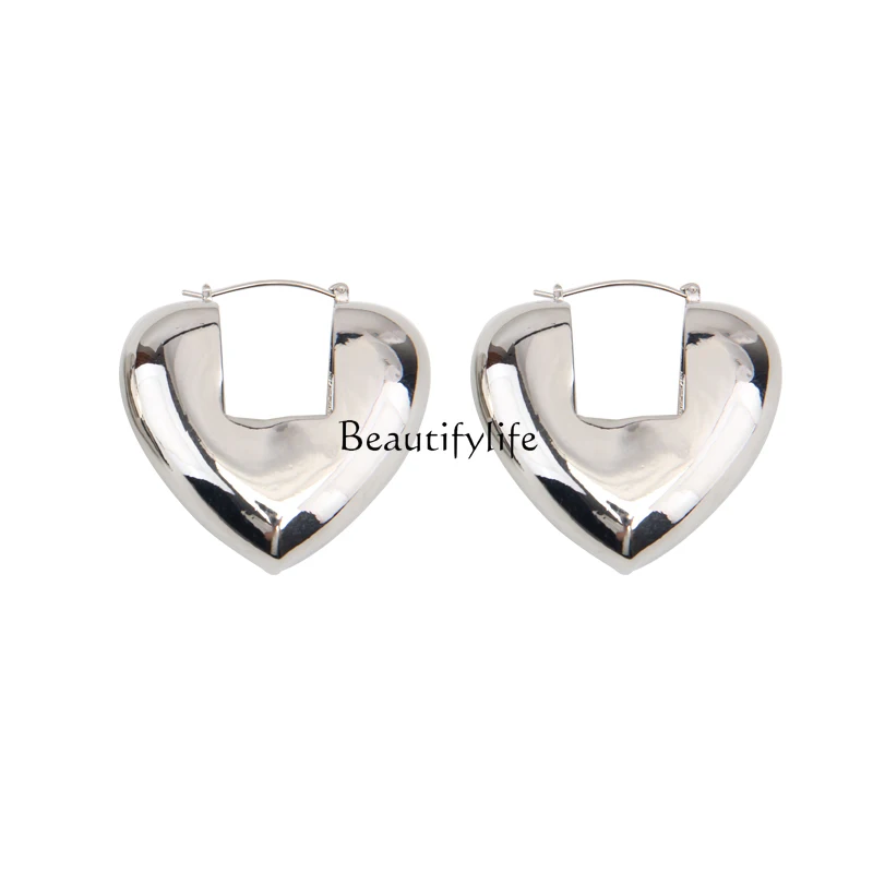 

Three-dimensional glossy metal love unique earrings minimalist premium exaggerated peach heart stud earrings