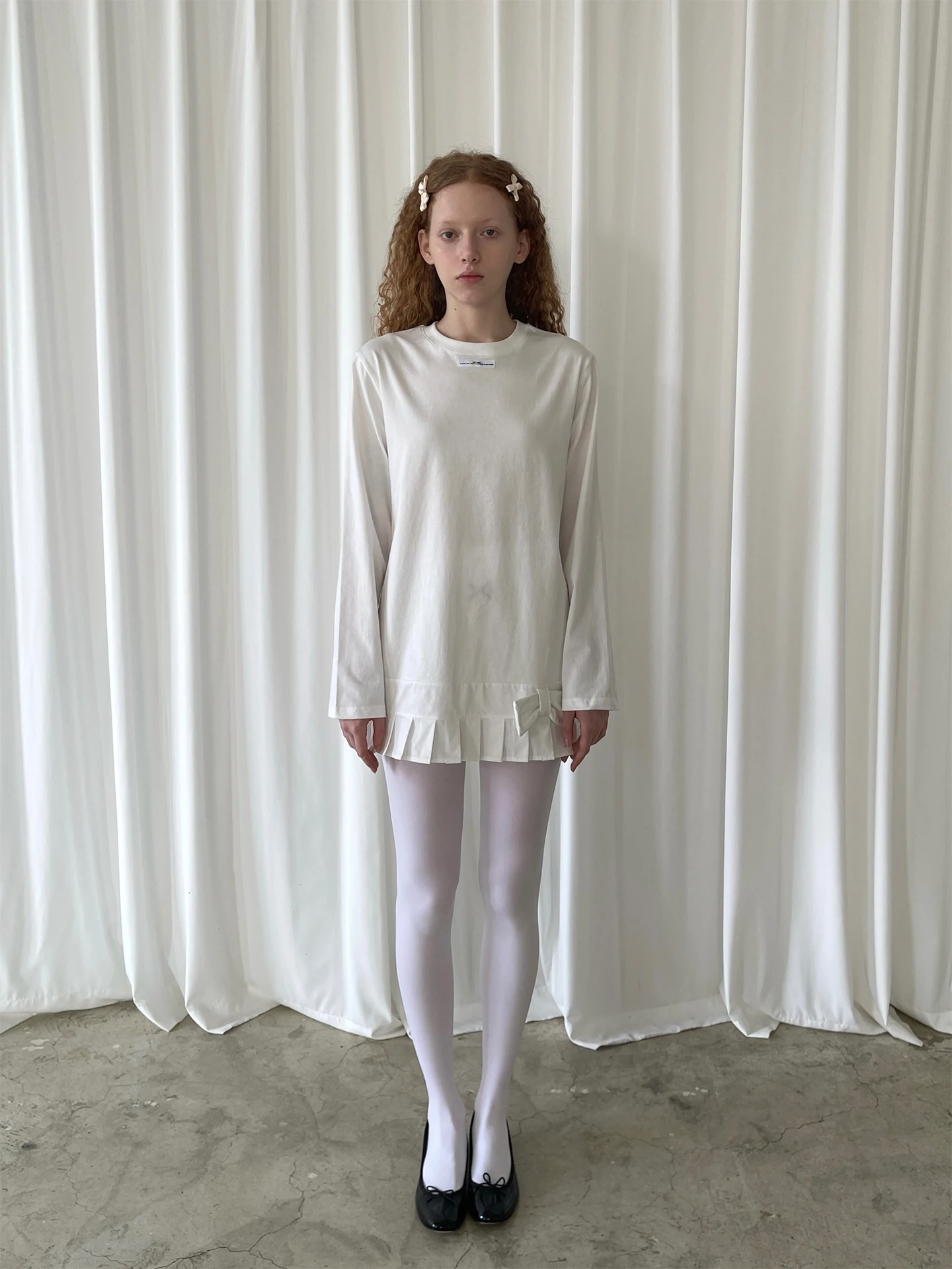 

White Logo Knot Hem T-irt Loose Fit Long Sve Cotton mid Length Ladies Faion Daily Wear Pattern