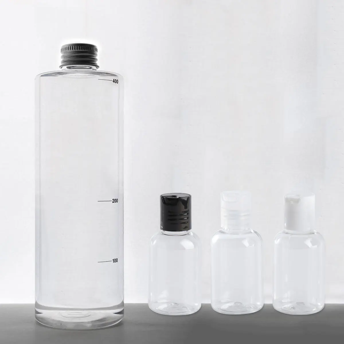 

12Pcs Lotion Bottles Clear Plastic Refillable Dispenser Container 50ml for Travel Shampoo Body Wash Liquid Cream Massage Oils