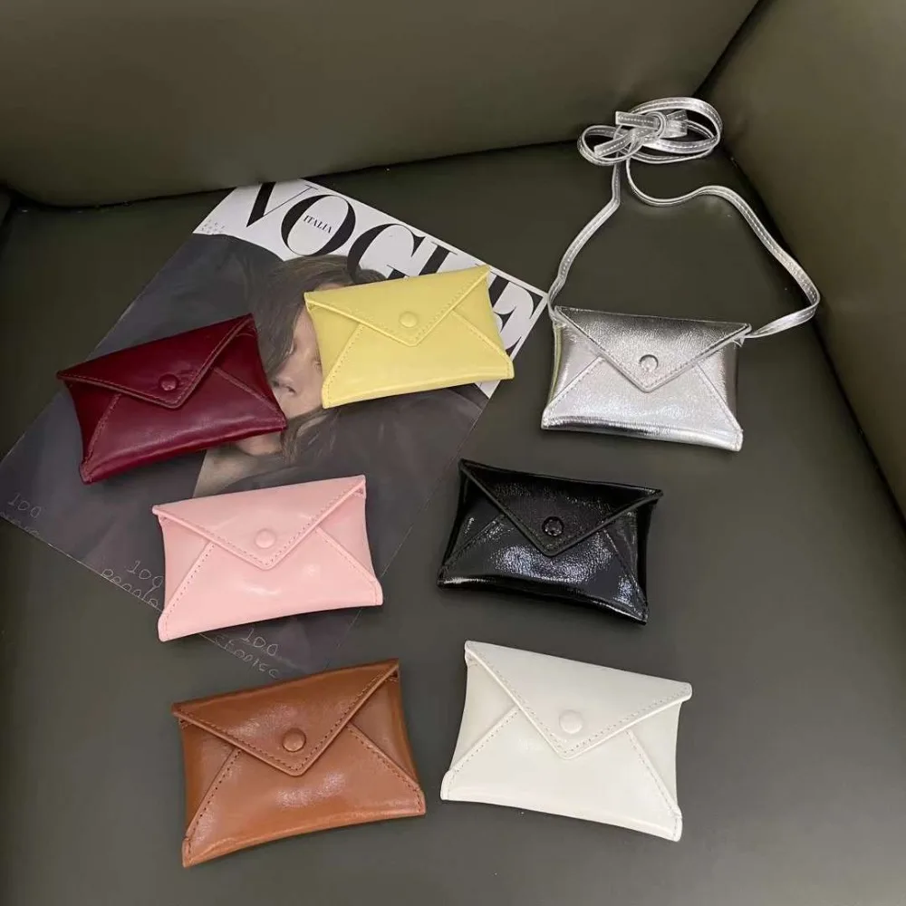 

NicheFirst Layer Cowhide Mini Messenger Envelope Card Bag Fanny Pack Neck Small Mouth Red Envelope Earphone Super Small Simple