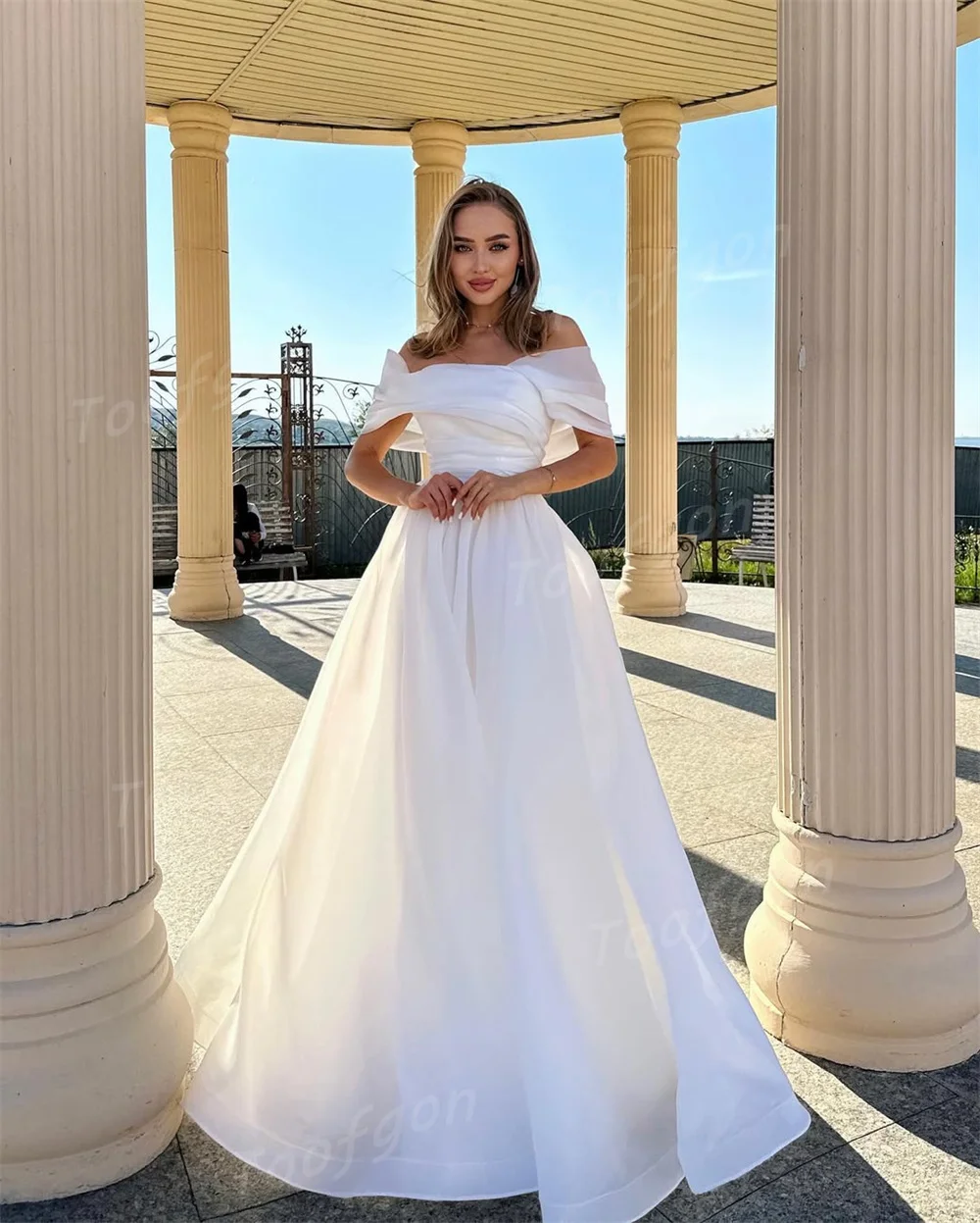 Toofgon Customized Off Shoulder A Line Wedding Dresses Organza Short Sleeve Bride Gown Backless Long Beach Boho Bridal Gown