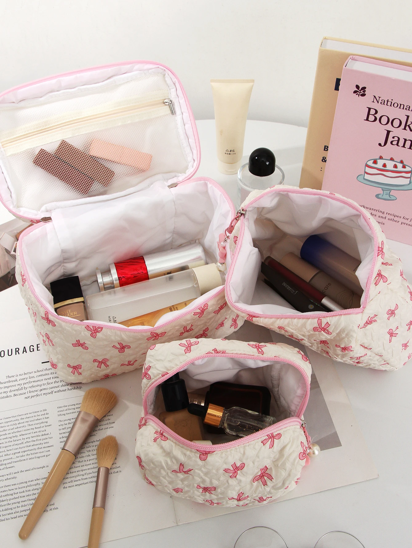 1 pièce/ensemble trousse de maquillage matelassée à nœud, trousse de maquillage à nœud multifonctionnelle, trousse de maquillage portable à la mode, trousse de maquillage essentielle pour toile