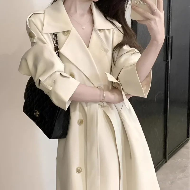 เสื้อโค้ทยาวทรงเทรนช์โค้ทสำหรับผู้หญิง EAEOVNI สไตล์ลำลองสำหรับใส่ทำงาน สีพื้น ติดกระดุม มีเข็มขัด  แฟชั่นฤดูใบไม้ร่วงปี 2025 เสื้อผ้าใหม่