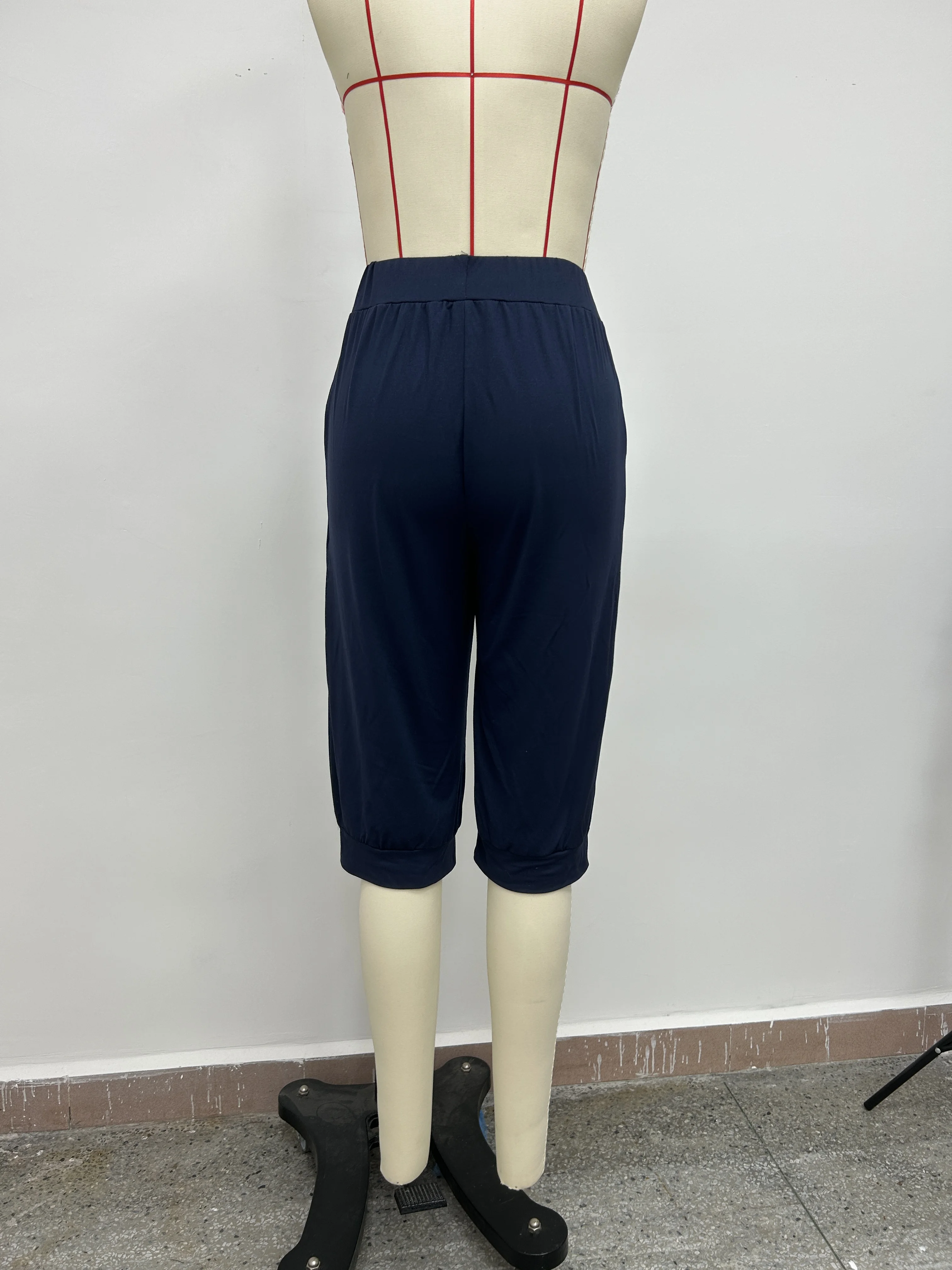 AliExpress Europäische und amerikanische grenzüberschreitende Sommer neue bedruckte, elastische Taille, Taschenbindung, kurze Hose