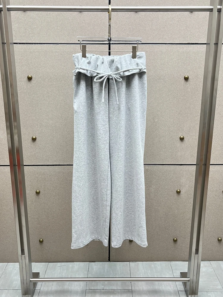 Grey casual straight-leg trousers, new for Autumn 2026, featuring a folded waistband and drawstring tie Women's trousers