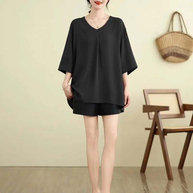 Pullover alla moda con scollo a V allentato da donna con scollo a V manica a cinque quarti tinta unita versatile semplice e confortevole top a mezza manica