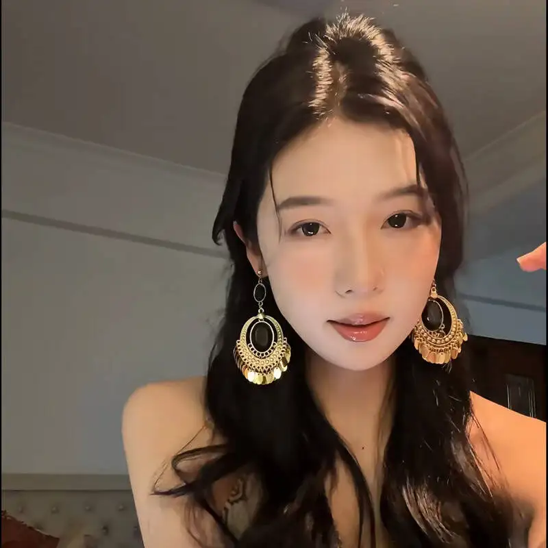 Elegant Vintage Ethnic Style Round Hollow Bohemian Elegant Niche Fashion Light Luxury Earrings Women