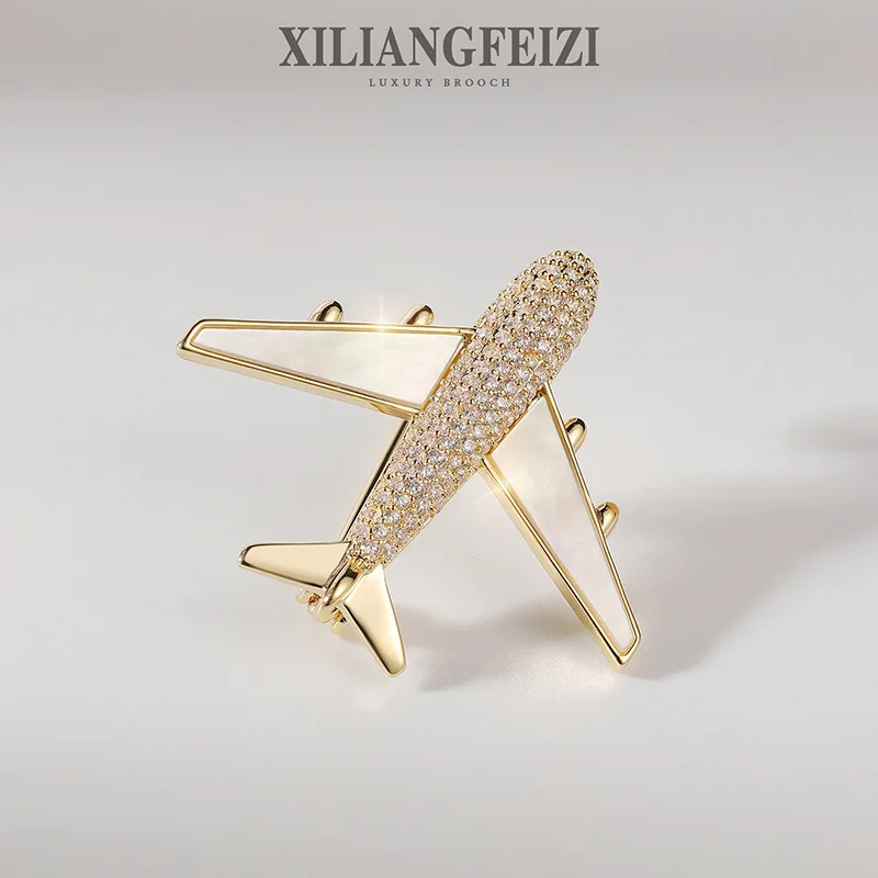 

Xiliang Concubine Korean Edition Fashionable And Minimalist Zircon Aircraft Brooch, High End Shell Clothing Accessories, Breast