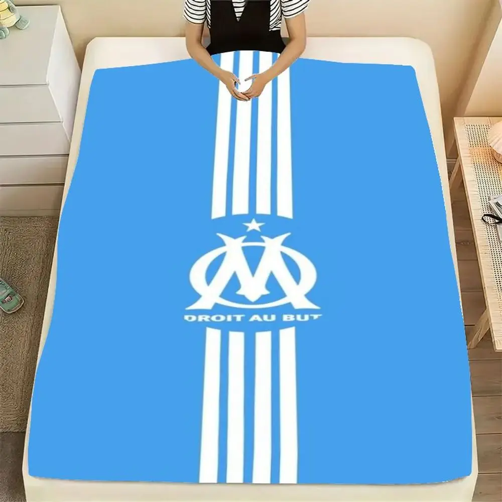 Minimalist Blue and White Striped Throw Blanket with Interlocking 'M' Emblem and 'DROIT AU BUT' Text - Soft and Cozy Lightweight