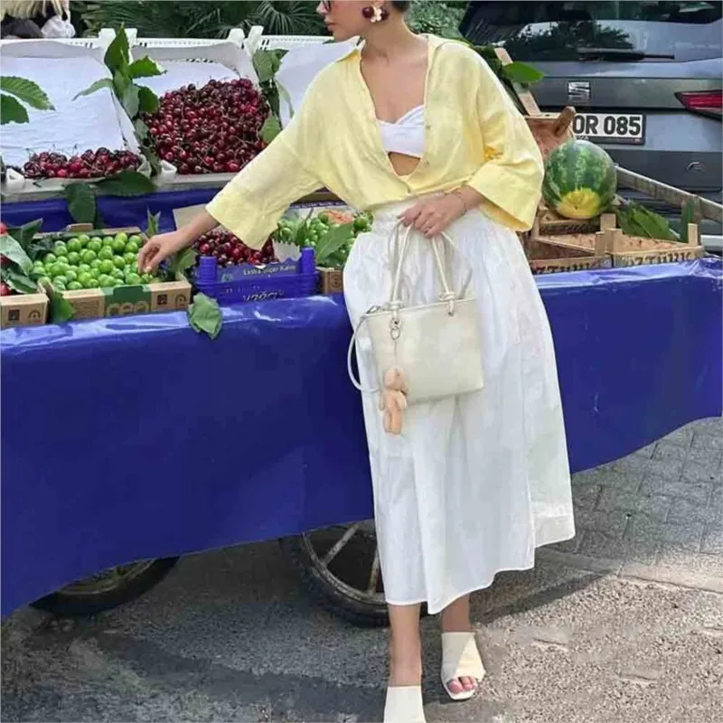 Camisa informal a rayas para mujer, blusa holgada con cuello vuelto y una botonadura, camisa de manga larga Vintage para oficina, novedad de verano 2025