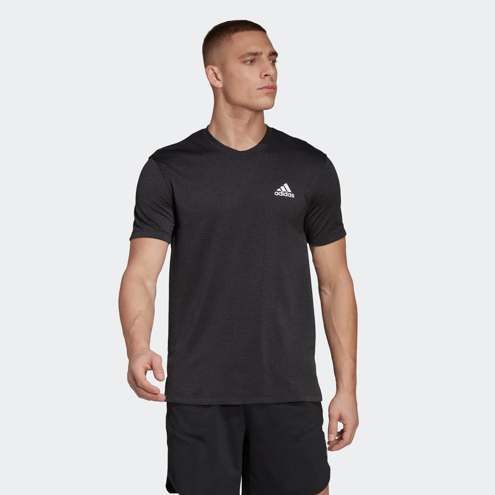

Adidas Men's Black Short - Sleeve Sports T - Shirt with White Brand Logo for Running and Fitness