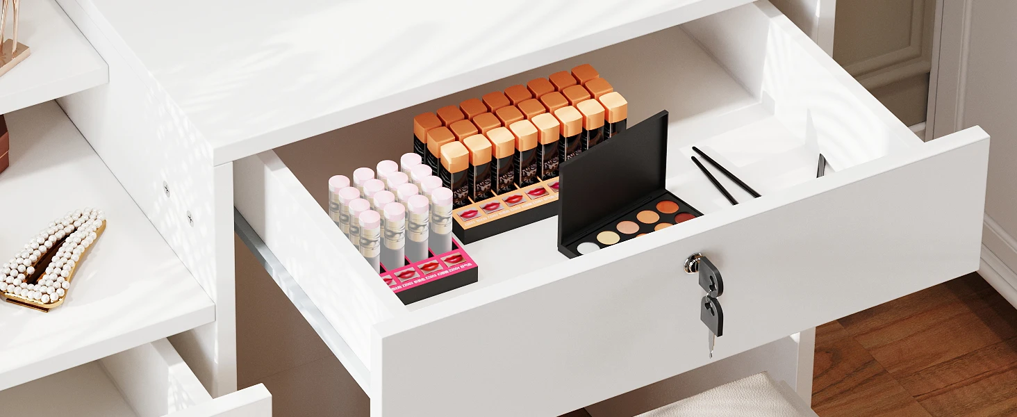 Open white drawer with organized makeup storage dividers, containing various cosmetic products including lipsticks, foundations, and other small containers in different colors.