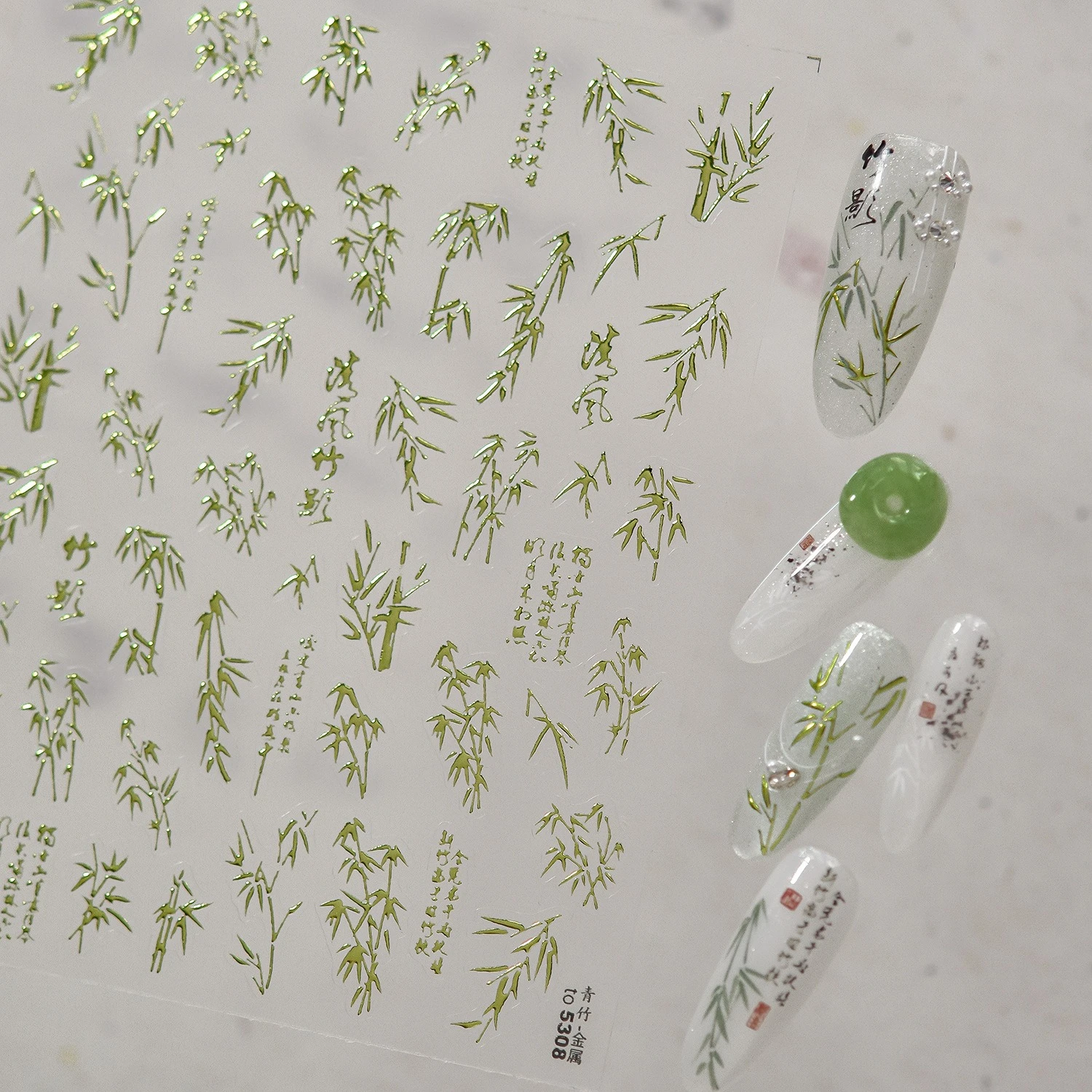 สติกเกอร์ติดเล็บลายใบไผ่สีเขียวทองโบราณขาวดำลายตัวอักษรจีนธรรมชาติสำหรับตกแต่งเล็บ