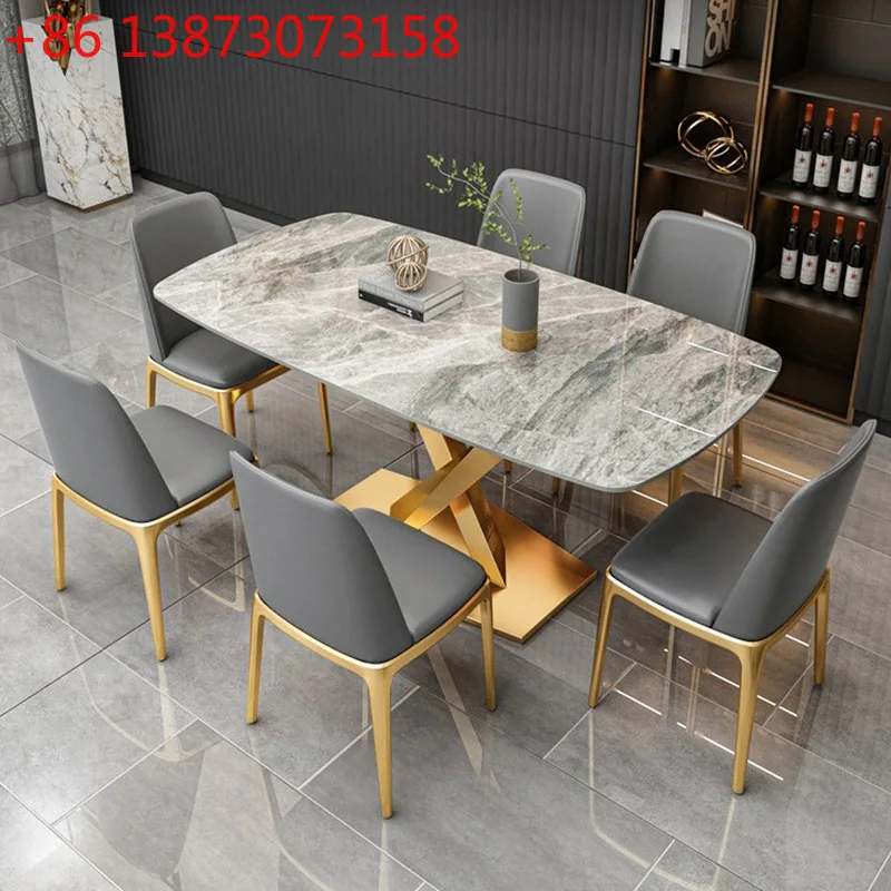 

Nordic simple rock slab dining table and chair combination household rectangular dining table high-end light luxury dining table
