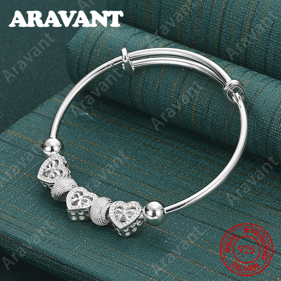 925 Sterling Silver Heart And Circle Interlocking Sliding Bangle - A Fresh And Elegant Engagement Jewelry Design For Women.