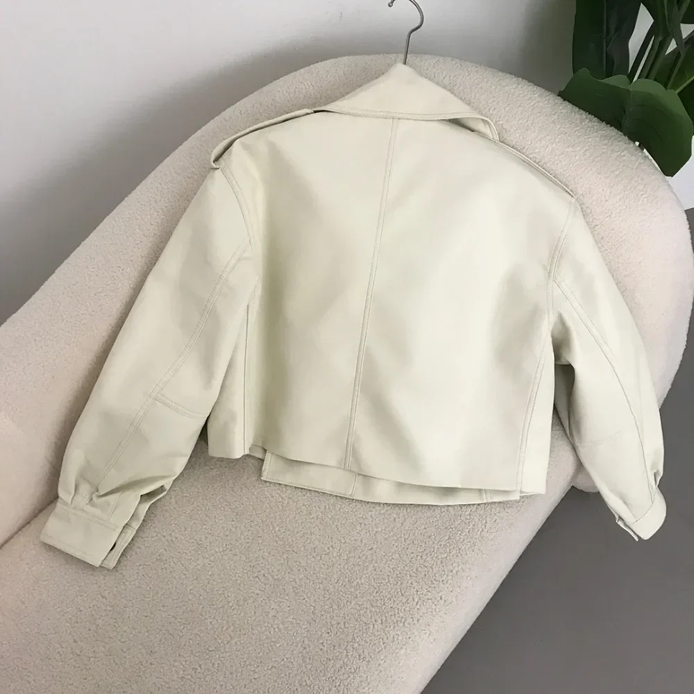 เสื้อแจ็คเก็ตหนังเทียมสไตล์อเมริกันสำหรับผู้หญิง ปกพับได้ รุ่นใหม่ เหมาะสำหรับฤดูใบไม้ผลิ สไตล์ไบค์เกอร์ ทรงหลวม สตรีทแวร์ เสื้อคลุม