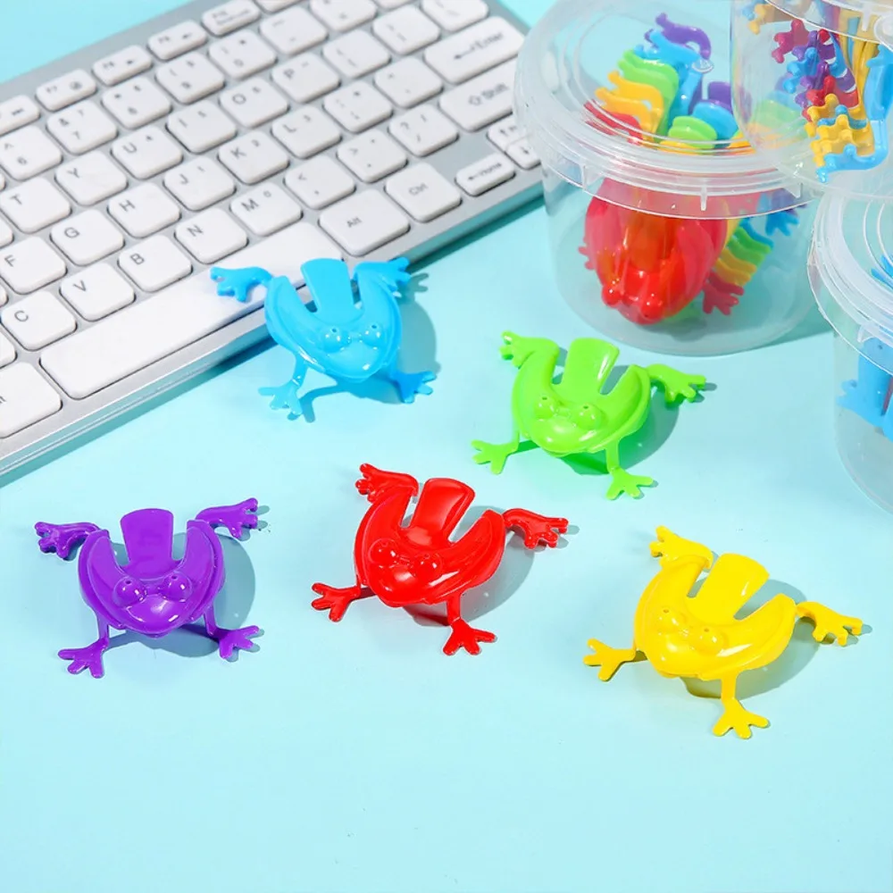 Divertenti giocattoli divertenti in plastica che salta colore casuale trasparente/colore solido giocattoli divertenti che rimbalzano giocattoli rana