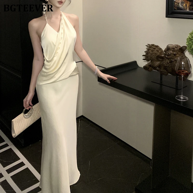 BGTEEVER エレガントなホルターパールノースリーブパッケージヒップサテンドレス女性のための春夏ファッションスリムウエストレディーススキニードレス