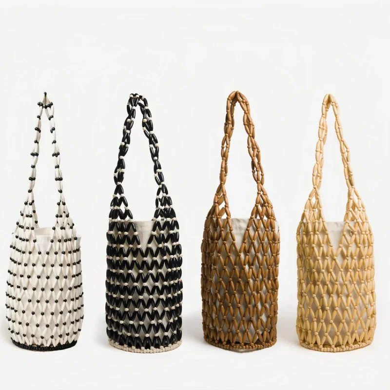 

Тканая сумка с деревянными бусинами, новый дизайн, брендовая женская сумка-ведро с полыми бусинами для путешествий на море, универсальная ручная сумка-ведро на плечо, подмышки