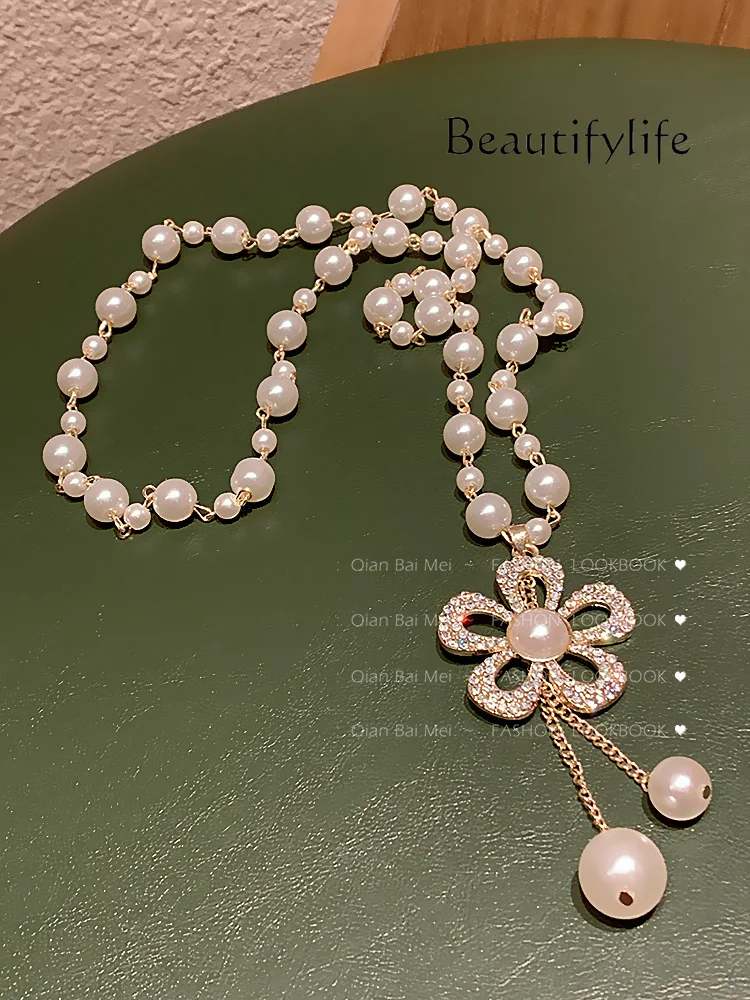 Pearl sweater chain, high-end atmospheric long necklace, new high-end multi-layer pendant chain.