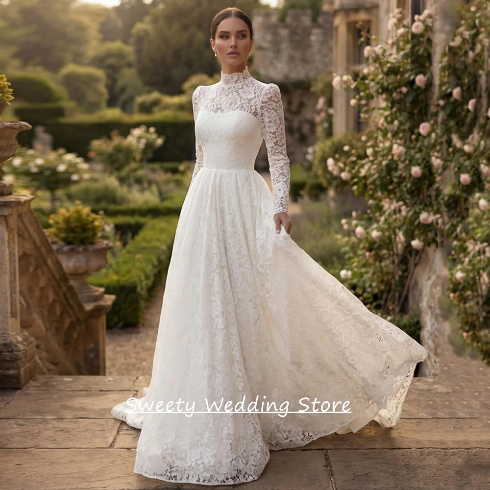 فستان زفاف عربي مخصص بأكمام طويلة ورقبة عالية دانتيل رائع سويب تراين فستان زفاف على شكل حرف A فيستدو دي نويفا