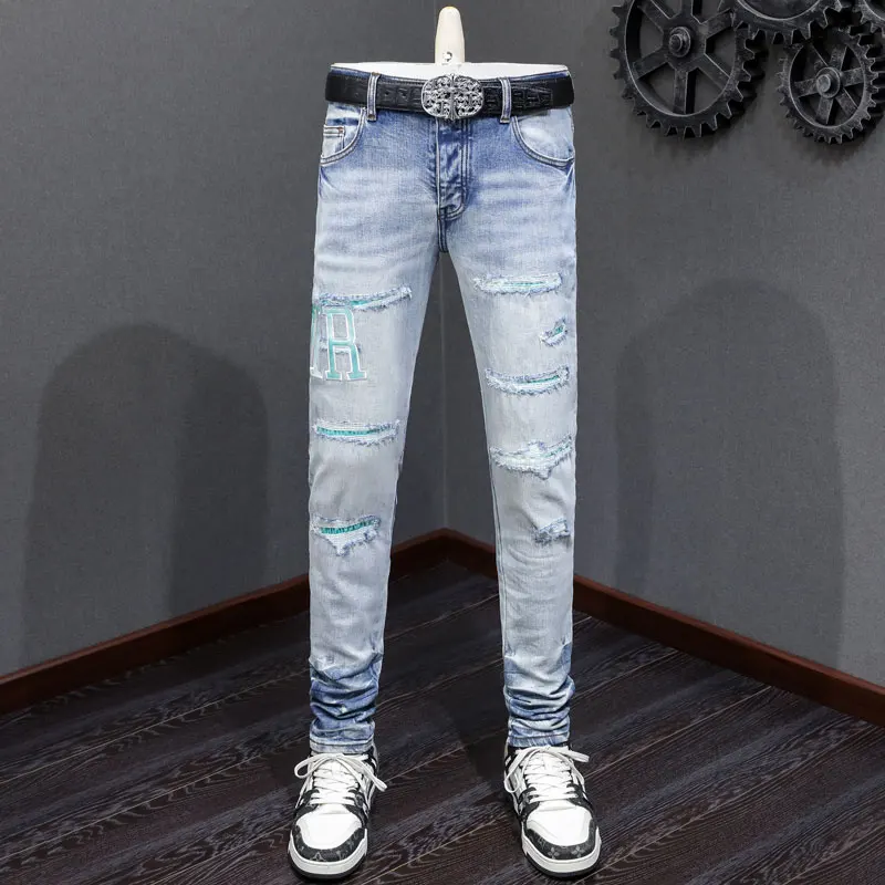 

Fashionable stretch slim fit washed light blue jeans designed by European and American designers. High Street Hip Hop Brand Pant