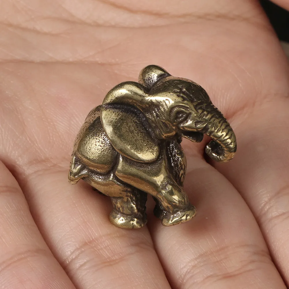 Exquisite Small Brass Elephant Statue for Desktop Display Handheld Decorative Ornament Representing Wealth and Auspiciousness