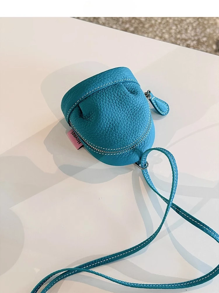 

Original first-layer cowhide schoolbag pendant earphone storage bag