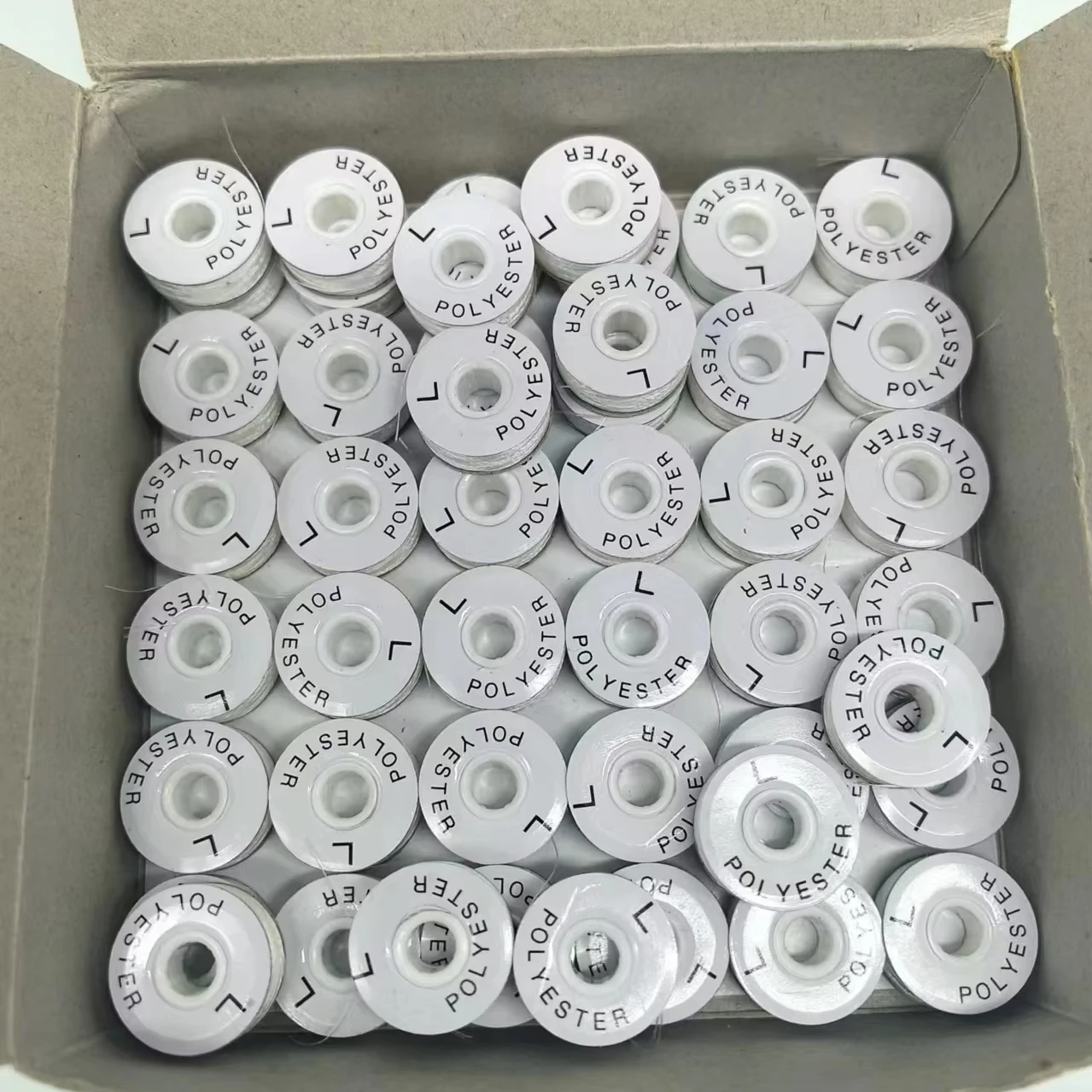 100% Polyester Filament High Tenacity Yarn 70D/2 Embroidery Spool Pre-Wound White Paper Side Spool for Garment Sewing