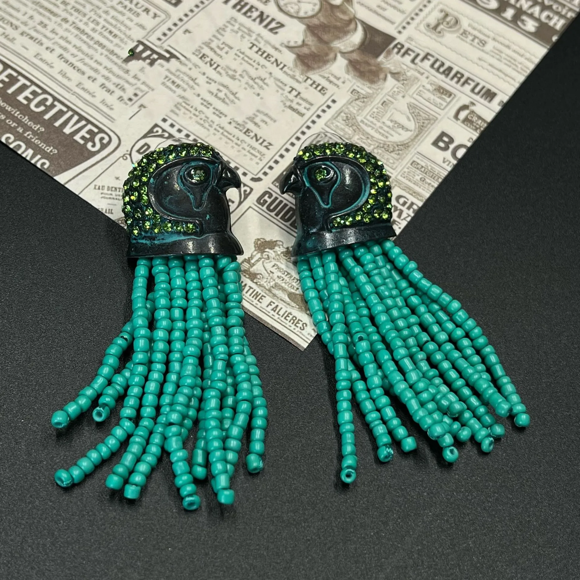 

European and American exaggerated vintage turquoise bead tassel bird head earrings