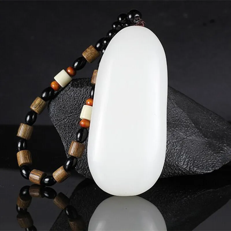 

Afghanistan white jade primary color original leather stone one picture and one object with the shape of the handle