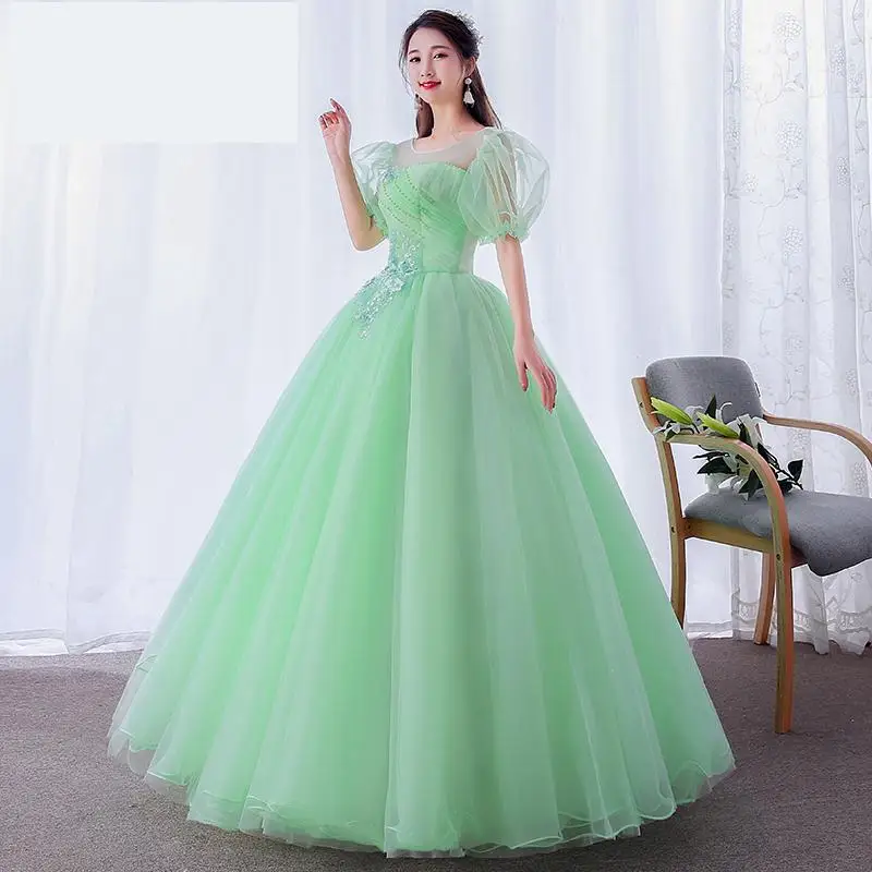 

Green Quinceanera Dresses Illusion Scoop Neck Long Ball Gown Dress Vintage Sweet Puff Sleeves Vestidos With Appliques 3 Colors