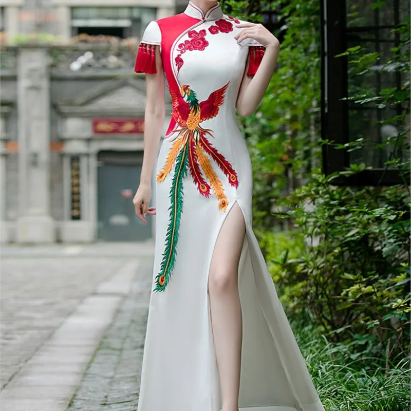 

A long elegant Chinese-style modified performance dress for women in the cheongsam fashion show