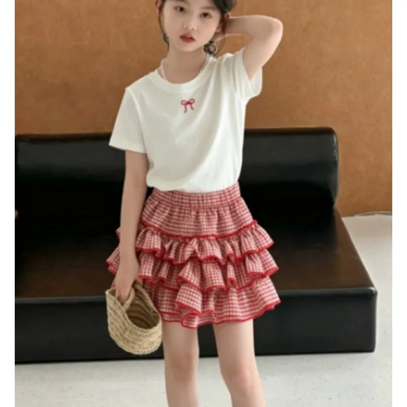 

2026 Baby Girls Korean Style Children's Clothing Set New Summer Baby Bow White T-shirt Checkered Skirt Pants