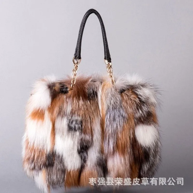 Korean version of fashion fur bag female autumn and winter new real hair hand color fox fur bag