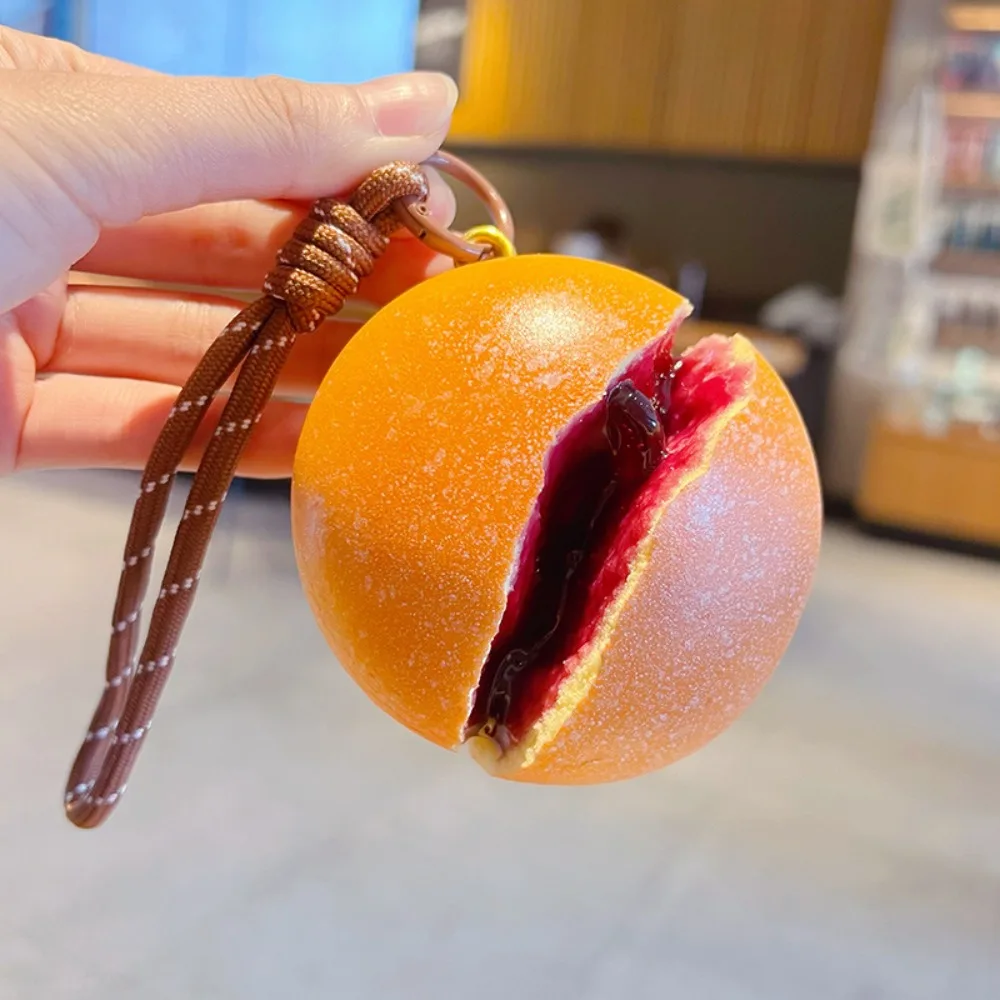 Porte-clés pain à rebond lent, simulation de pression, avec garniture fruitée, imitation dessert, en PU élastique