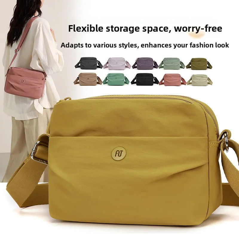 

Ткань быка, сумка через плечо на одно плечо, женская весенне-летняя новая повседневная нейлоновая сумка для ушей, парусиновая сумка для мамы