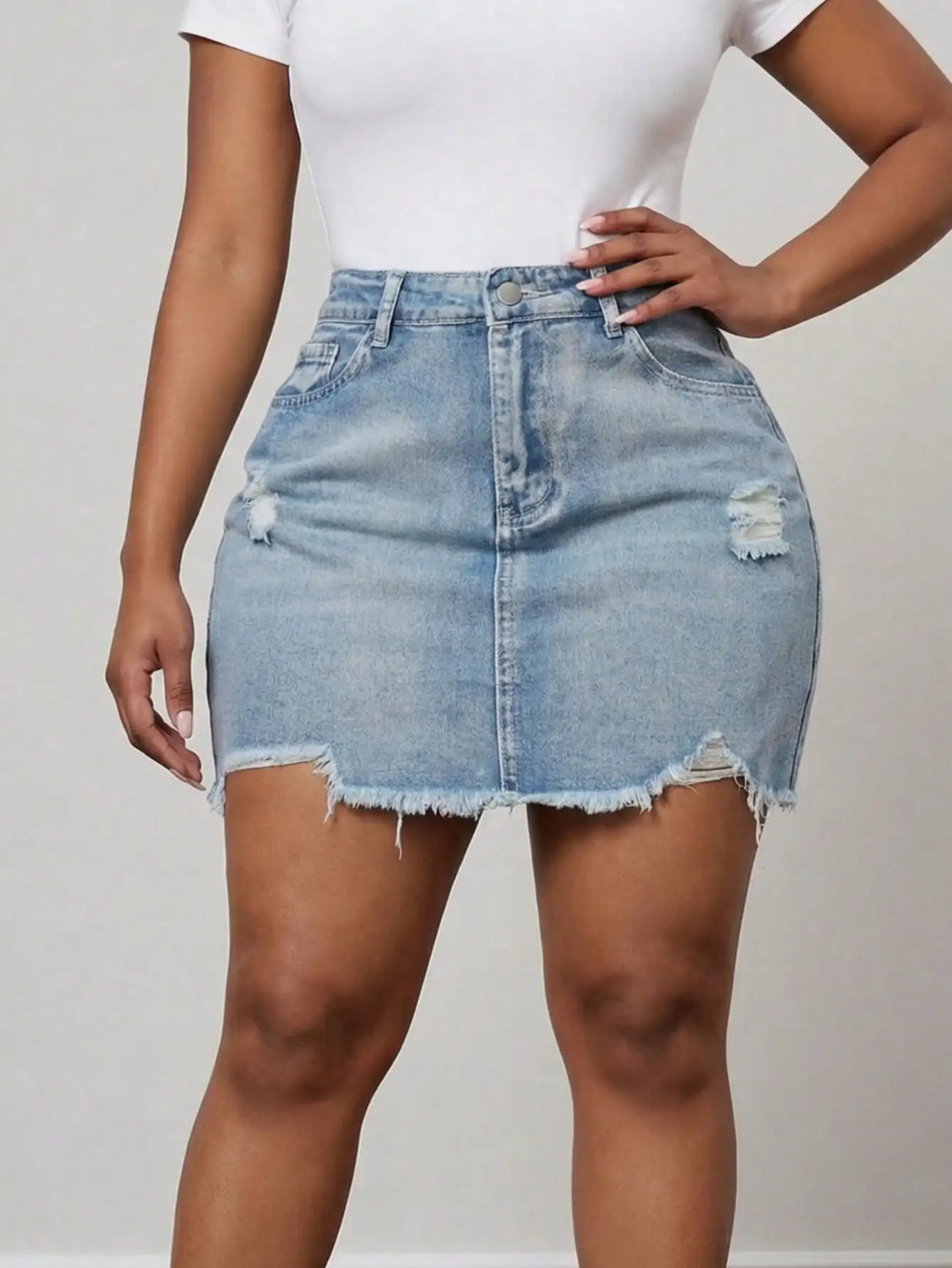 

Women's High Waisted Distressed Denim Mini Skirt with Raw Hem
