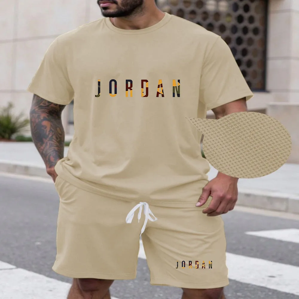 

New summer fitness sportswear for men, short-sleeved T-shirt and shorts two-piece set, breathable and quick-drying casual wear.