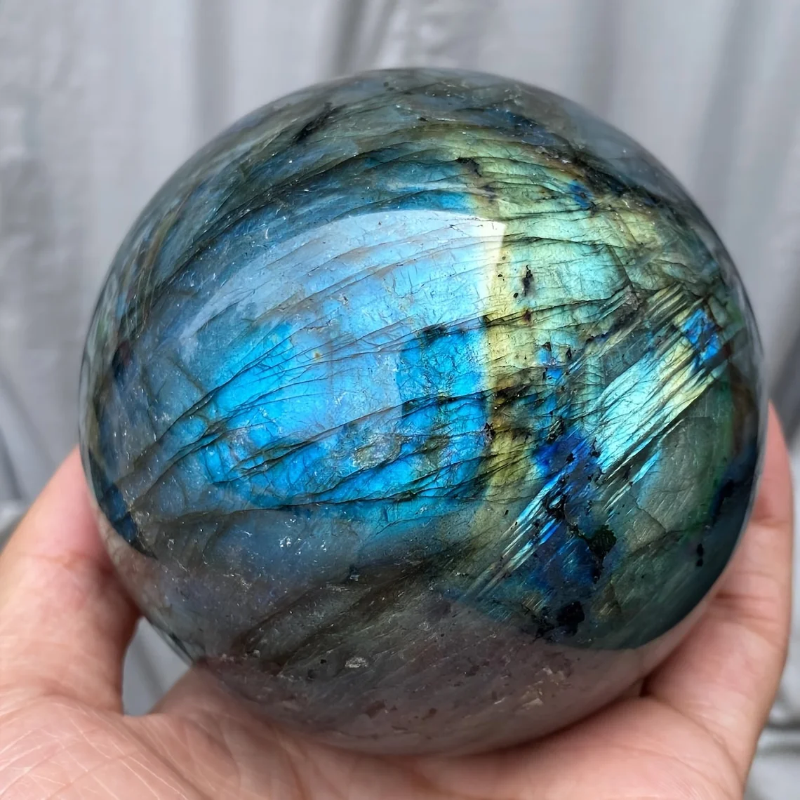 A Natural Labradorite Sphere, Suitable for Feng Shui, Divination, Home Decoration, and Photography. A Natural Crystal Ball
