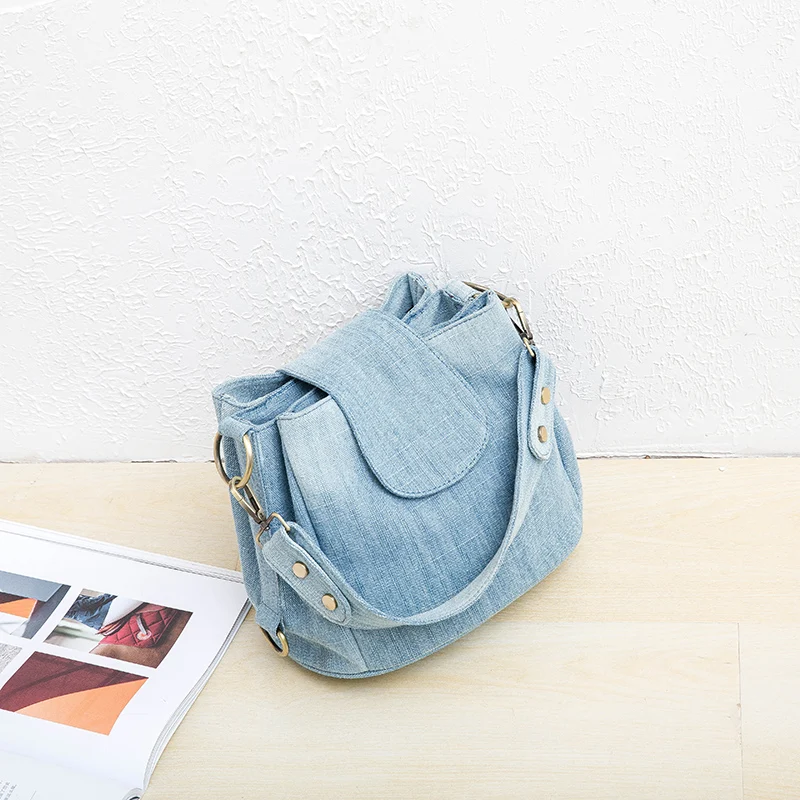 Kadınlar için rahat Denim kova çanta omuz Crossbody çanta birden cepler bayanlar çanta lüks tasarım kadın büyük kılıf mavi