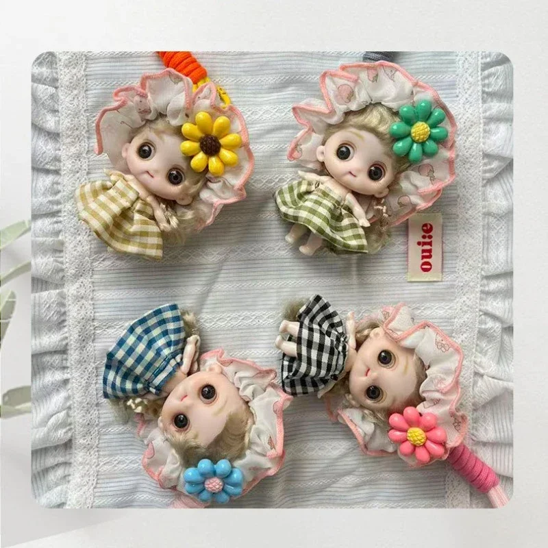 Mignon dessin animé tête tournesol poupée porte-clés pendentif sac à main pendentif voiture porte-clés suspendu.