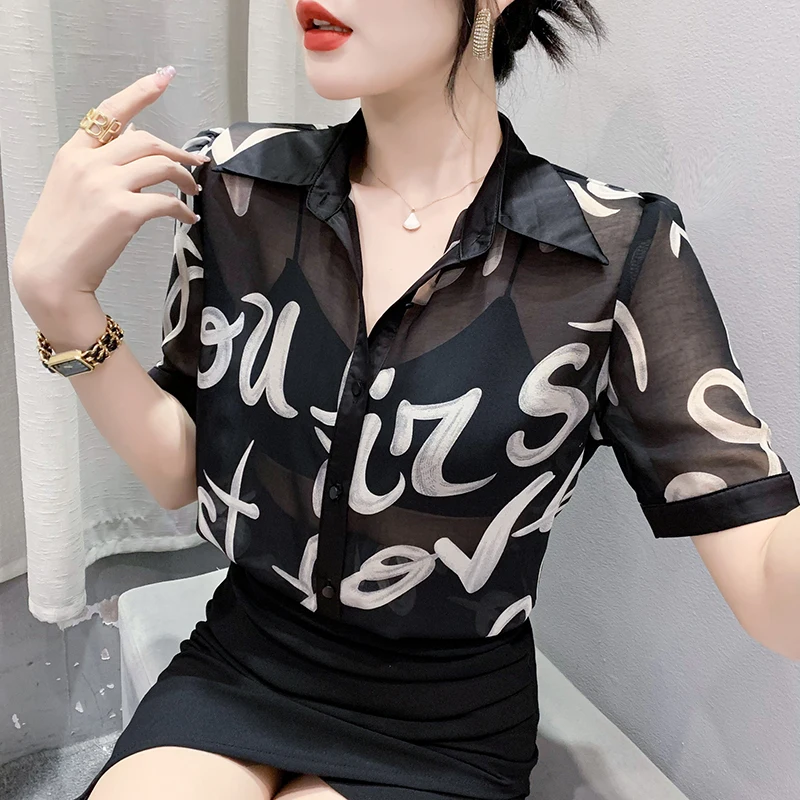 MadBlack Summer European Clothes Transparent Shirts Women Sexy Turn Down Collar Letter Print Loose Tops Short Sleeves T35277C