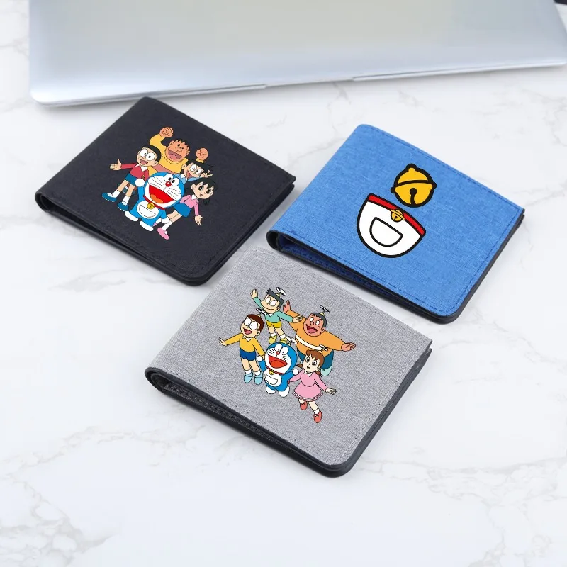 Monederos bonitos de Doraemon, cartera con estampado de dibujos animados, monedero portátil Unisex para exteriores, carteras de moda para hombres y mujeres, regalos nuevos