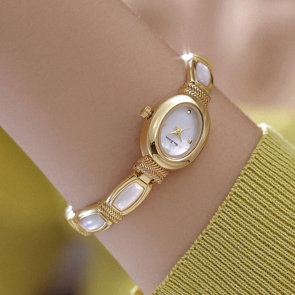BS جديد كوارتز ساعات نسائية طبيعية قسط الأبيض ضوء القمر شل سوار ساعة امرأة أنيقة خمر ضوء فاخر
