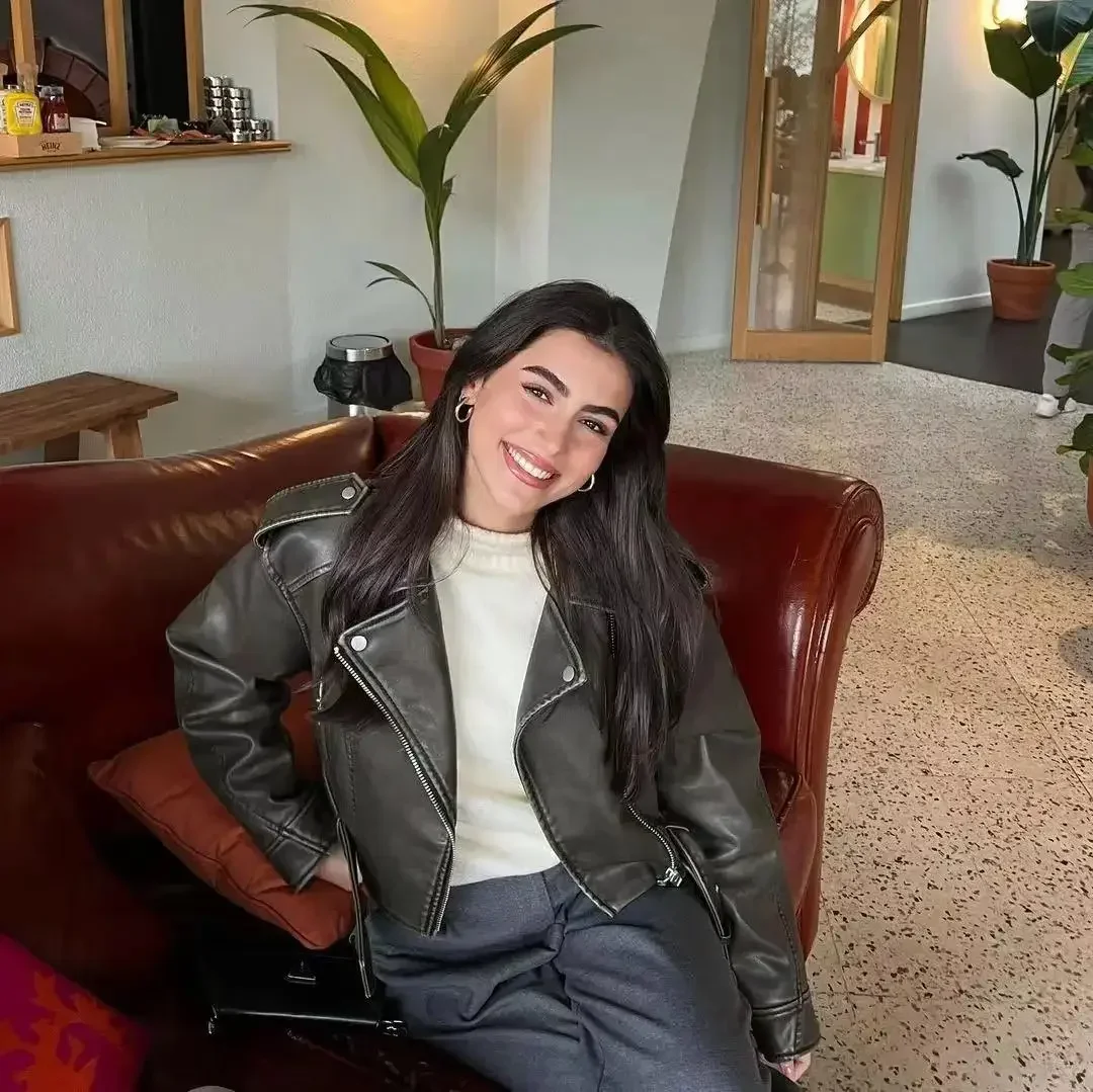 سترة نسائية كبيرة الحجم فضفاضة من الجلد الصناعي الصناعي مع حزام ملابس الشارع الشهير معطف نسائي بسحاب ريترو موتو لراكبي الدراجات النارية ملابس خارجية