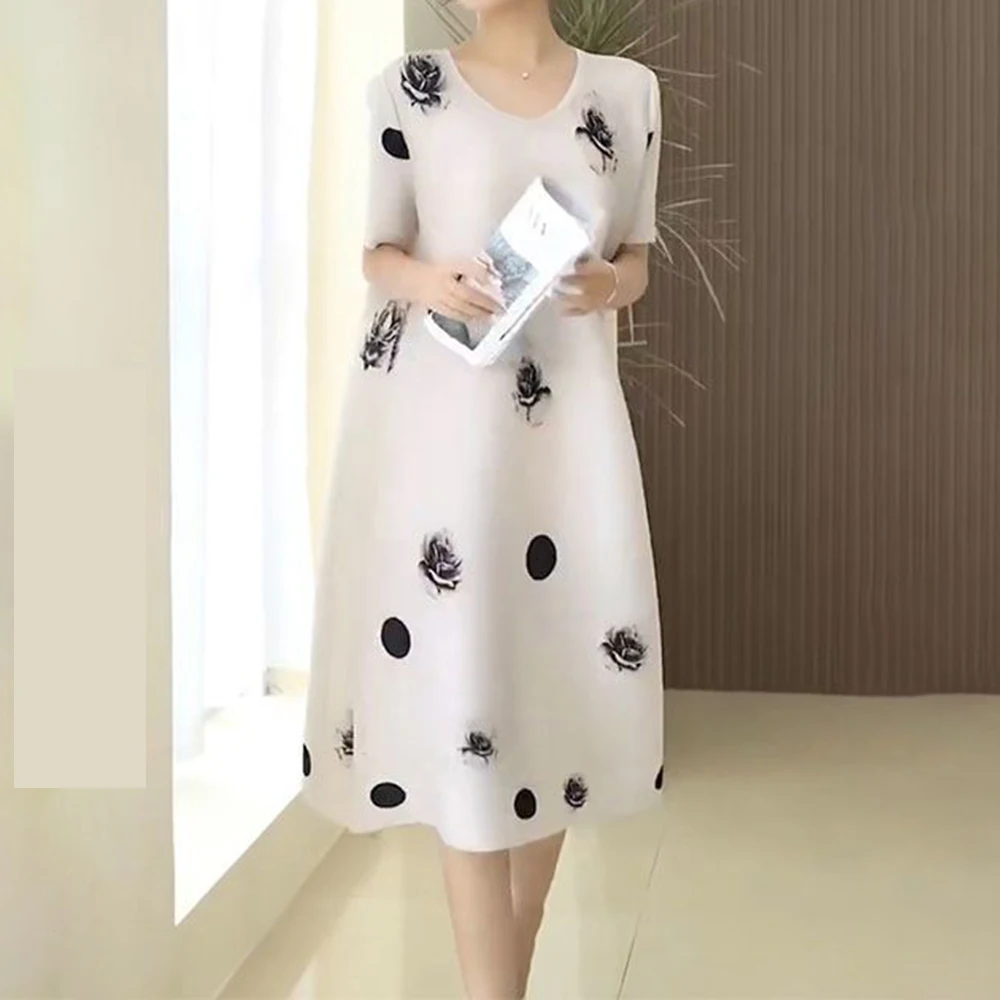 

2026 summer new pleated printing loose and simple round neck short sleeve light luxury dress women's clothing medium and long