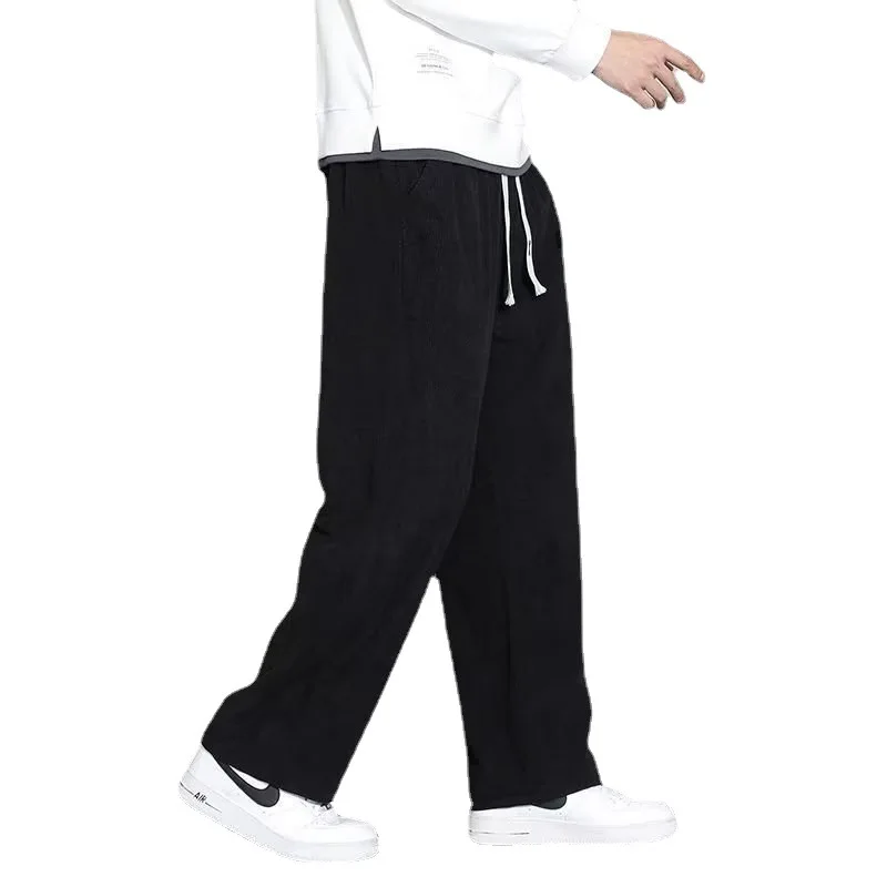 Primavera autunno moda temperamento coreano velluto a coste pantaloni a gamba larga uomo sciolto Casual tinta unita pantaloni sportivi maschili