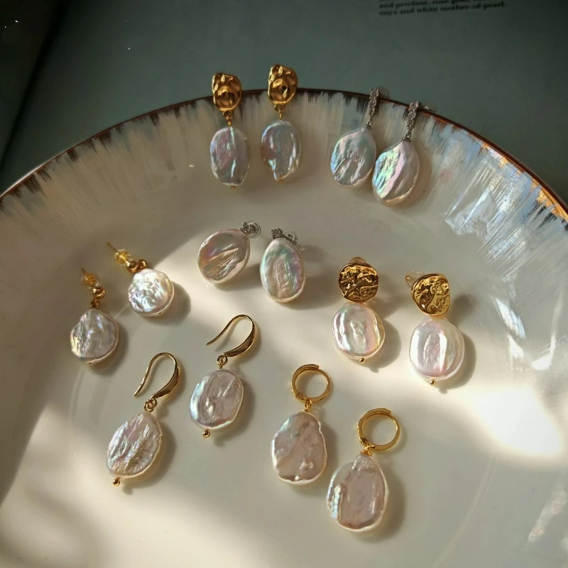 

Autumn Winter New Year Classic Natural Freshwater Pearl Irregular Oval High-end Simple Travel Daily Matching Earrings